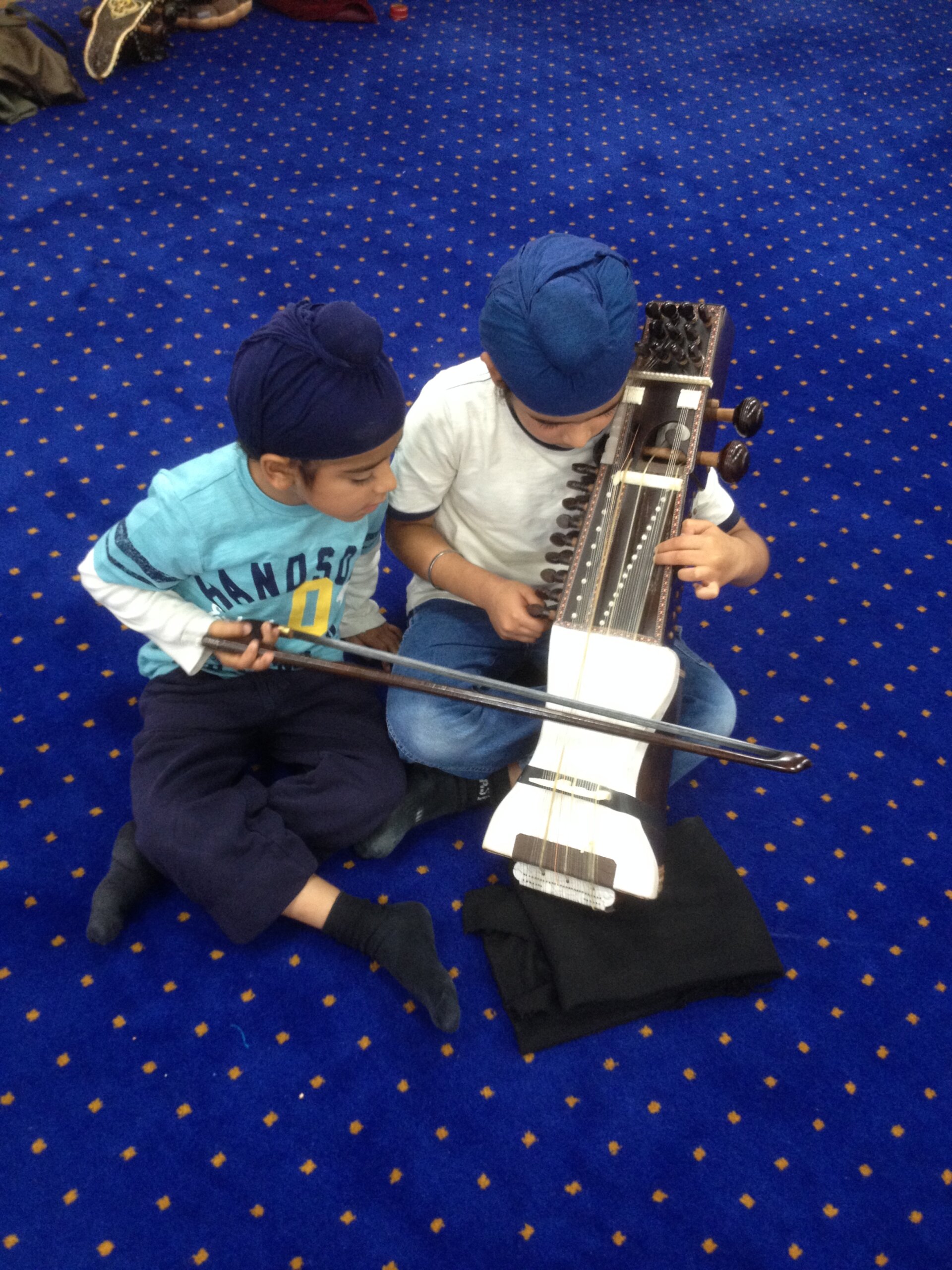 two-brothers-playing-sarangi-together